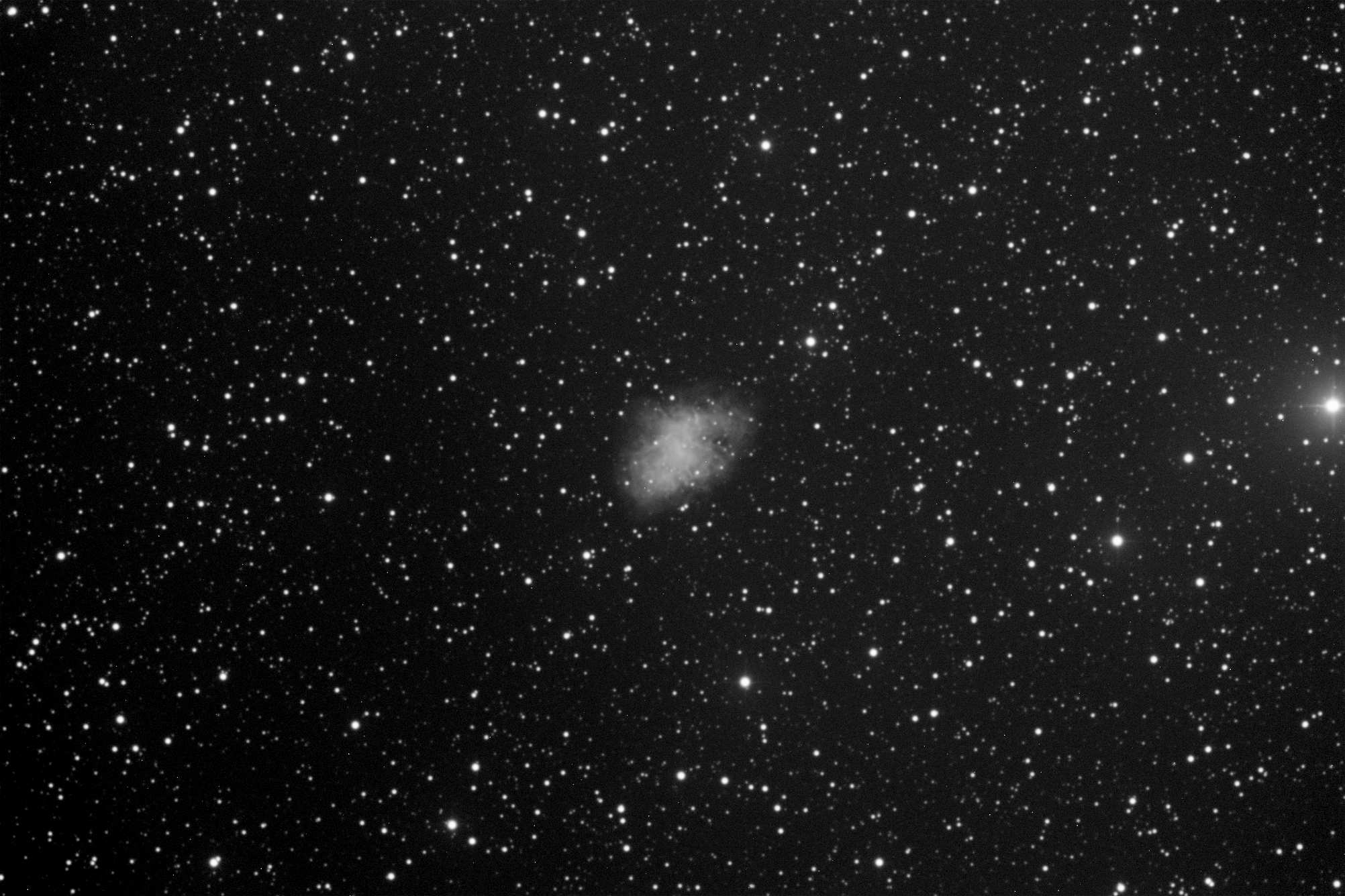 Crab Nebula M1 photographed through a telescope