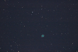 Ring Nebula M57 photographed through a telescope